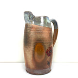 Pitcher with poppies