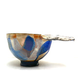 Rainbow bowl with pierced handle